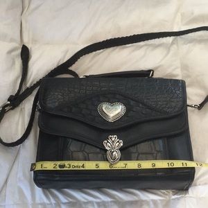 Crossbody purse with handle and wallet included.
